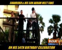 Shah Rukh Khan greets his fans with son Abram