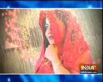 Daayan Mohana dances in the rain in a red saree