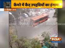 CAA Protest: Video shows how protesters set bus on fire and pelted stones on Delhi Police