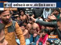 Shirtless protesters demonstrate against Delhi Police for thrashing Jamia students