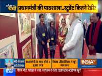 PM Modi at an exhibition ahead of his interaction with school students during 