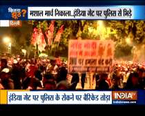Indian Youth Congress members hold torch rally at India Gate against yesterday