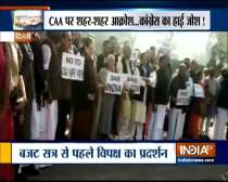Day before Union Budget, Opposition leaders protest in front of Gandhi statue in Parliament
