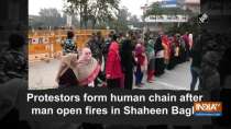 Protestors form human chain after man open fires in Shaheen Bagh