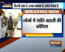 Delhi violence: Security forces conduct flag march in Maujpur
