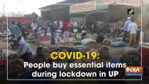 COVID-19: People buy essential items during lockdown in UP