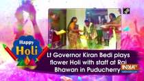 Lt Governor Kiran Bedi plays flower Holi with staff at Raj Bhawan in Puducherry