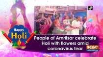 People of Amritsar celebrate Holi with flowers amid coronavirus fear