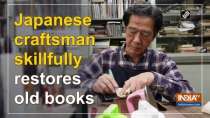 Japanese craftsman skillfully restores old books