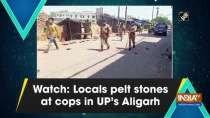 Watch: Locals pelt stones at cops in UP