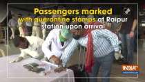 Passengers marked with quarantine stamps at Raipur station upon arrival