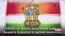 COVID-19: Artists paint street walls in Assam