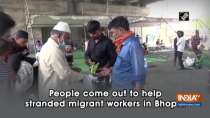People come out to help stranded migrant workers in Bhopal