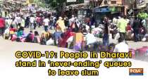 COVID-19: People in Dharavi stand in 
