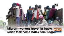 Migrant workers travel in trucks to reach their home states from Nagpur