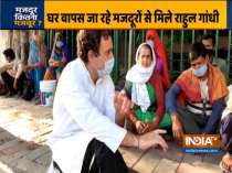Congress leader Rahul Gandhi interacts with migrant labourers who were returning to their home states