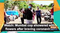 Watch: Mumbai cop showered with flowers after braving coronavirus