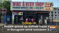 COVID-19: People queue up outside liquor shop in Gurugram amid lockdown 3.0