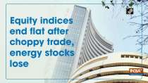 Equity indices end flat after choppy trade, energy stocks lose