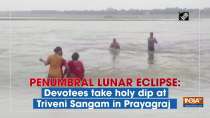 Penumbral lunar eclipse: Devotees take holy dip at Triveni Sangam in Prayagraj