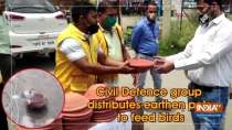 Civil Defence group distributes earthen pots to feed birds