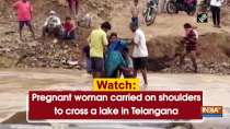 Watch: Pregnant woman carried on shoulders to cross a lake in Telangana