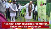 HM Amit Shah launches Plantation Drive from his residence