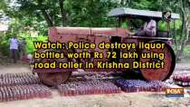 Watch: Police destroys liquor bottles worth Rs 72 lakh using road roller in Krishna District