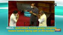 Watch: Jyotiraditya Scindia greets Congress leaders before taking oath as RS member