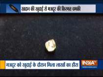 A labourer finds a 10.69 carat diamond from a mine in Ranipura area of Panna district