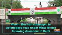 Watch: Bus half submeged in waterlogged road under Minto Bridge following downpour in Delhi