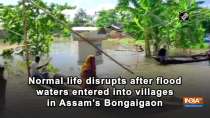 Normal life disrupts after flood waters entered into villages in Assam