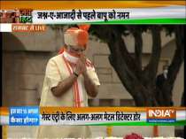 Prime Minister Narendra Modi pays tributes at Raj Ghat