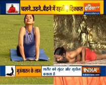Bhujangasana is helpful in treating back pains, says Swami Ramdev