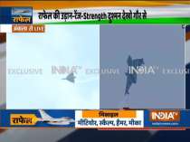 Air display of Rafale aircraft flanked by SU-30 and Jaguar aircraft in arrow formation