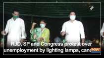 RJD, SP and Congress protest over unemployment by lighting lamps, candles