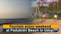 Tourists enjoy weekend at Padubidri Beach in Udupi
