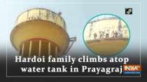 Hardoi family climbs atop water tank in Prayagraj