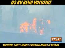 Wildfire, gusty winds threaten homes in Reno, Nevada