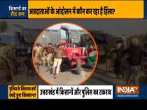Anti-farm laws protesters run tractor over police barricade in Uttarakhand