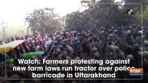Watch: Farmers protesting against new farm laws run tractor over police barricade in Uttarakhand