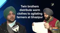 Twin brothers distribute warm clothes to agitating farmers at Ghazipur