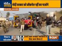 Haqikat Kya Hai | Agitating farmers run a tractor over a police barricade in Bajpur