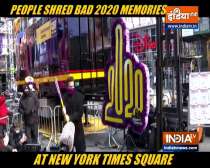 People shred bad 2020 memories at NY Times Square