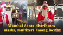 Mumbai Santa distributes masks, sanitizers among locals