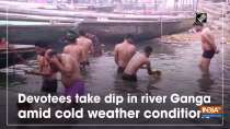 Devotees take dip in river Ganga amid cold weather conditions