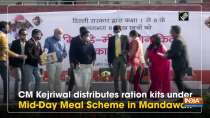 CM Kejriwal distributes ration kits under Mid-Day Meal Scheme in Mandawali