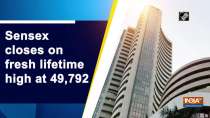 Sensex closes on fresh lifetime high at 49,792
