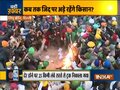 Farmers protesting at Singhu Border burn copies of the Farm Laws to celebrate Lohri