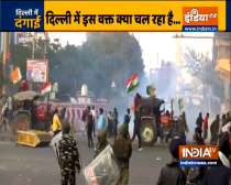 Delhi: Farmers break police barricades at Peeragarhi Chowk, move towards Punjab Bagh